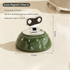 A green magnetic kitchen timer with a wind-up mechanism and a ringing function is shown on a light surface.