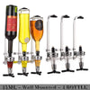 Wall mounted rotating dispenser for spirits featuring three glass bottles.