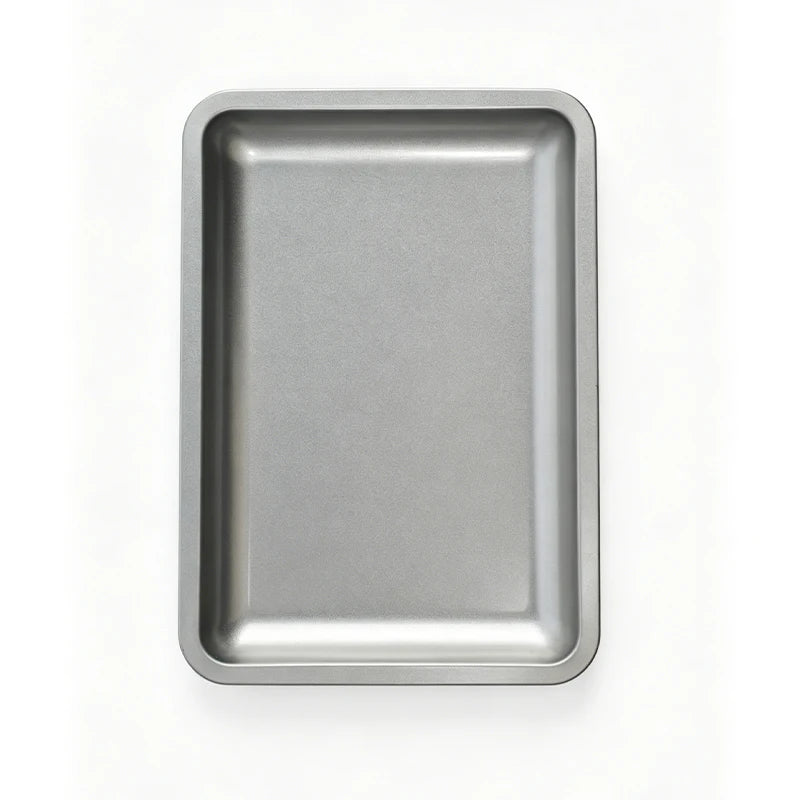 A rectangular stainless steel tray for professional nail art and dental tools.