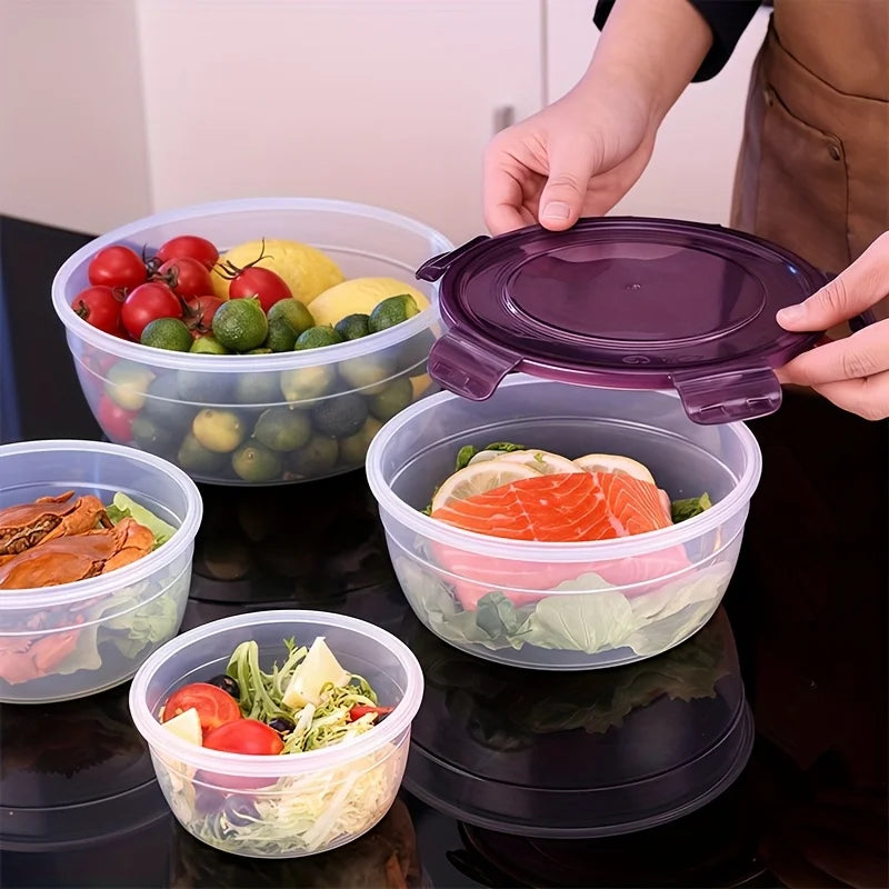 A hand is opening a purple airtight food storage container, revealing fresh salmon and greens inside.