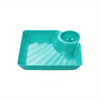 A teal serving plate with a separate bowl for appetizers or charcuterie.