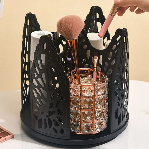 A black mesh dispenser rack holds four white cups and several makeup brushes.