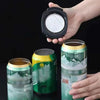 A hand holds a black can opener and a green can, demonstrating the 2-in-1 multifunctional tool.