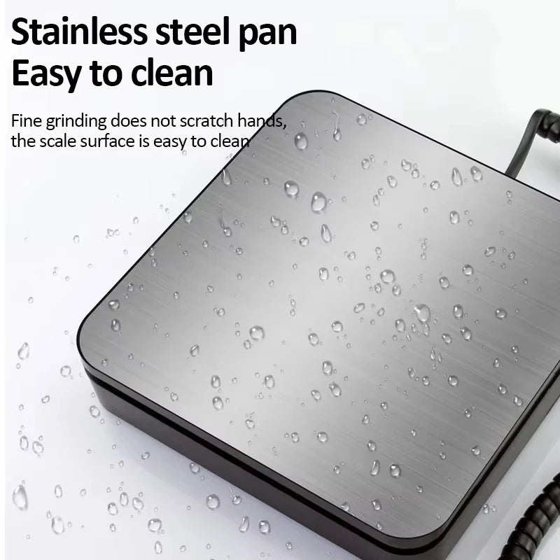 A stainless steel pan with fine grinding surface and condensation droplets shown on a white background.