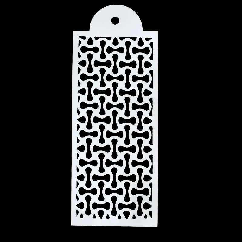 White plastic cake stencil set with a decorative honeycomb pattern.
