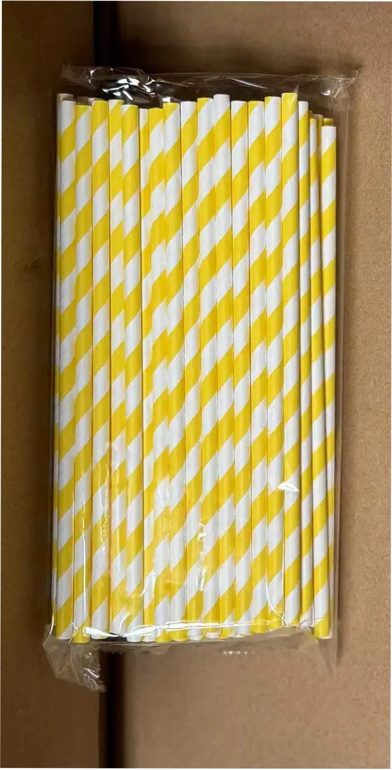 A pack of yellow and white striped disposable party straws in a clear plastic bag.