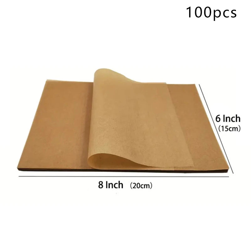 A stack of 100 non-stick baking sheets made of premium parchment paper, measuring 8 inches by 6 inches.