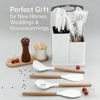 A white storage container holds a set of kitchen knives and silicone tools, with individual wooden and white utensils display