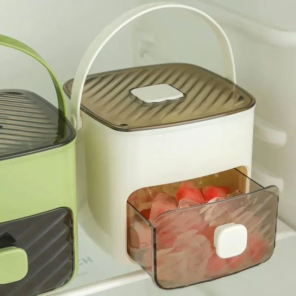 A white reusable grid ice cube mold set with a clear compartment filled with pink ice cubes.