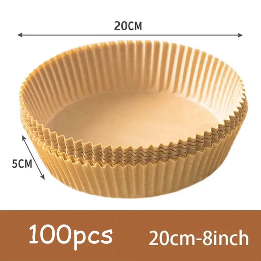 A round, light beige disposable non-stick baking mat with fluted edges shown from above.