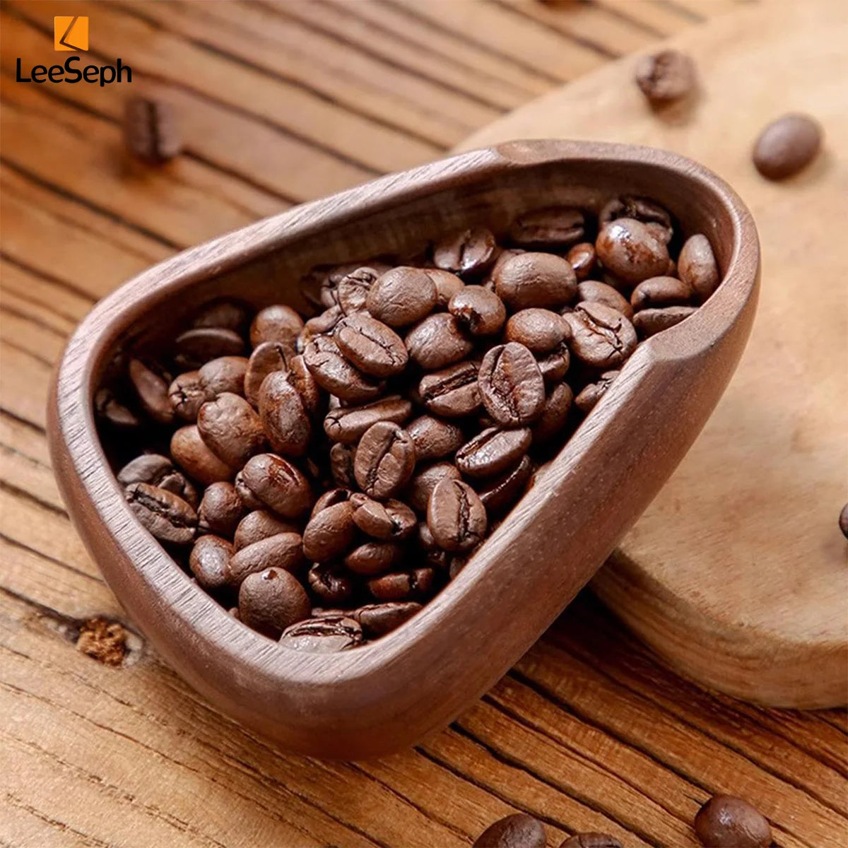 A wooden dosing cup filled with roasted coffee beans is shown on a light wooden surface.