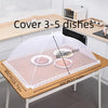 A foldable mesh food and plant protection cover placed on a wooden table, ready to cover 3-5 dishes.