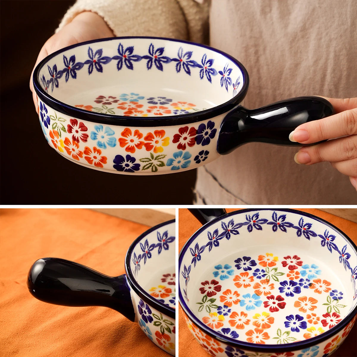 A hand holds a colorful floral ceramic baking pot with a dark handle and patterned interior.