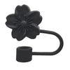 A black flower-shaped straw cap designed for tumblers.