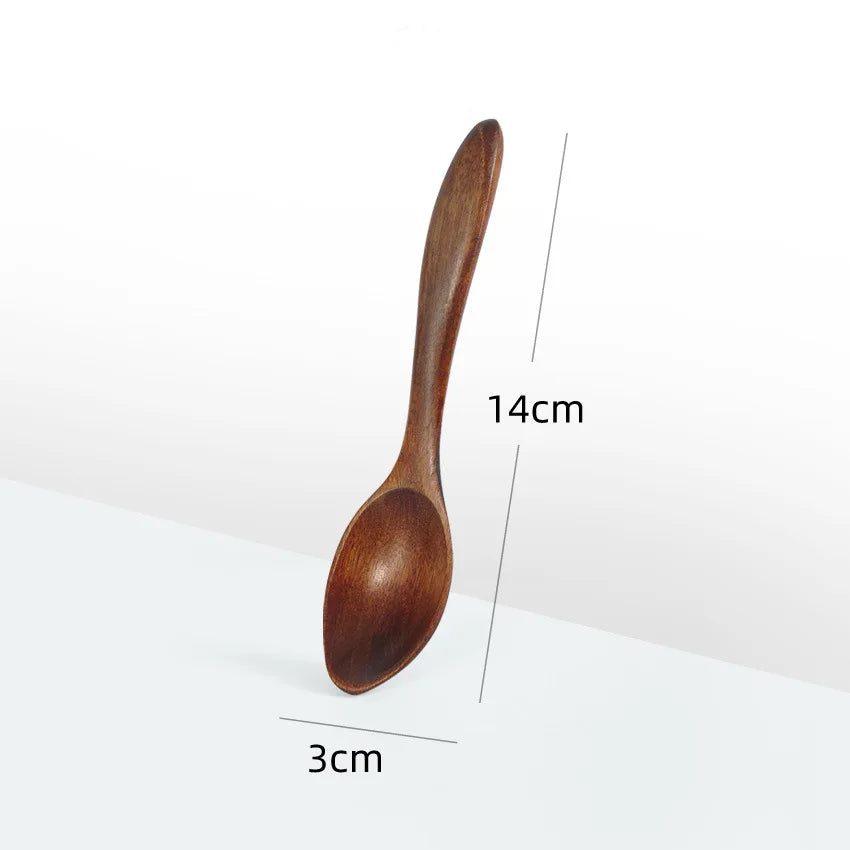 A dark brown wooden stirring spoon with a long handle, shown against a white background.