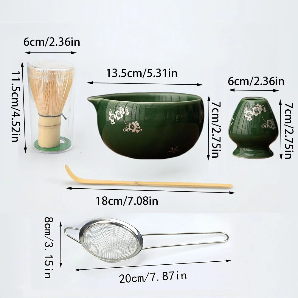 A set of matcha tools including a bamboo whisk, a green ceramic bowl, and a metal strainer.