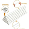 A bundle of white reusable plastic cake dowels showing their smooth surface and strong flexibility.