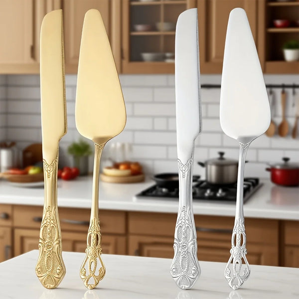 A set of elegant vintage stainless steel bread knife and cake spatula with ornate handles.