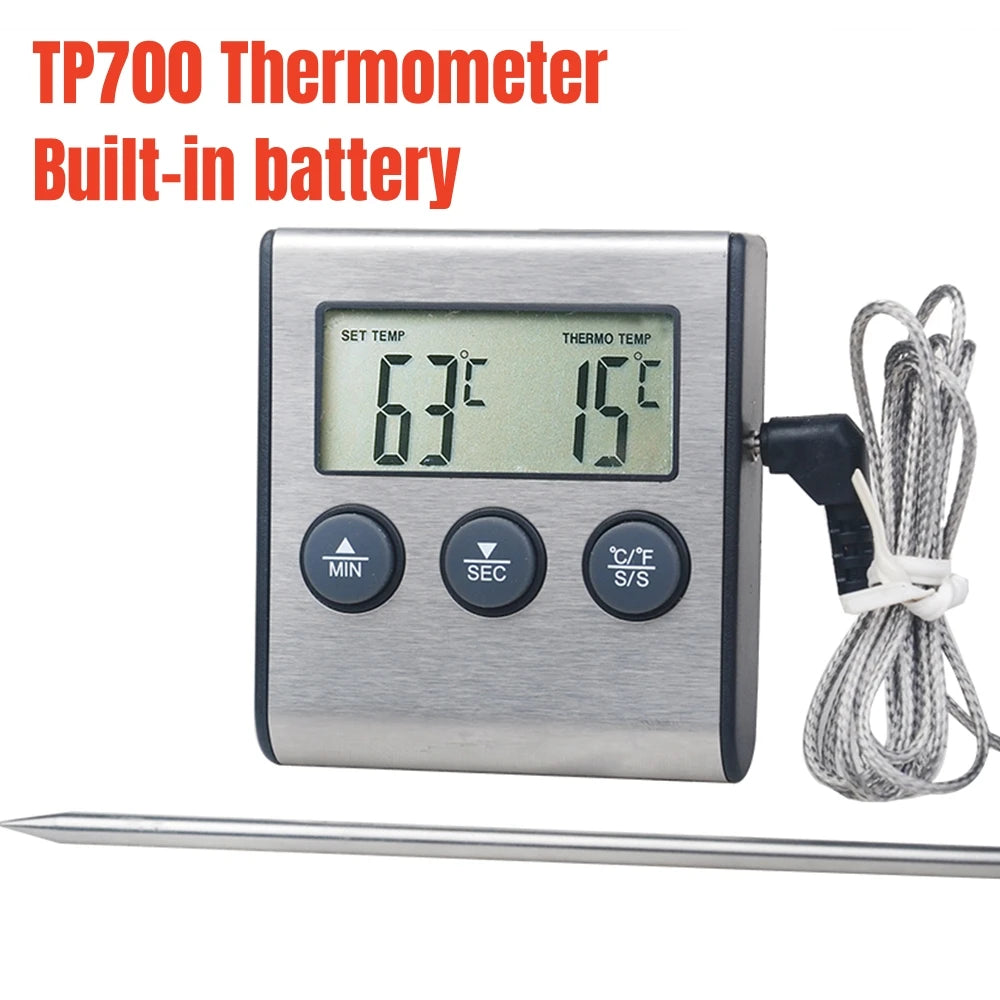 A silver digital thermometer with a built-in battery and cord is shown next to a metal probe.