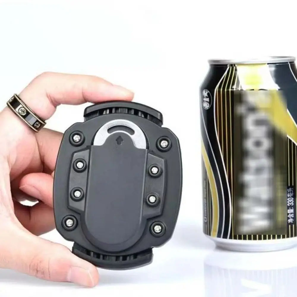 A hand holds a black 2-in-1 beverage opener and corkscrew tool next to an open can of soda.