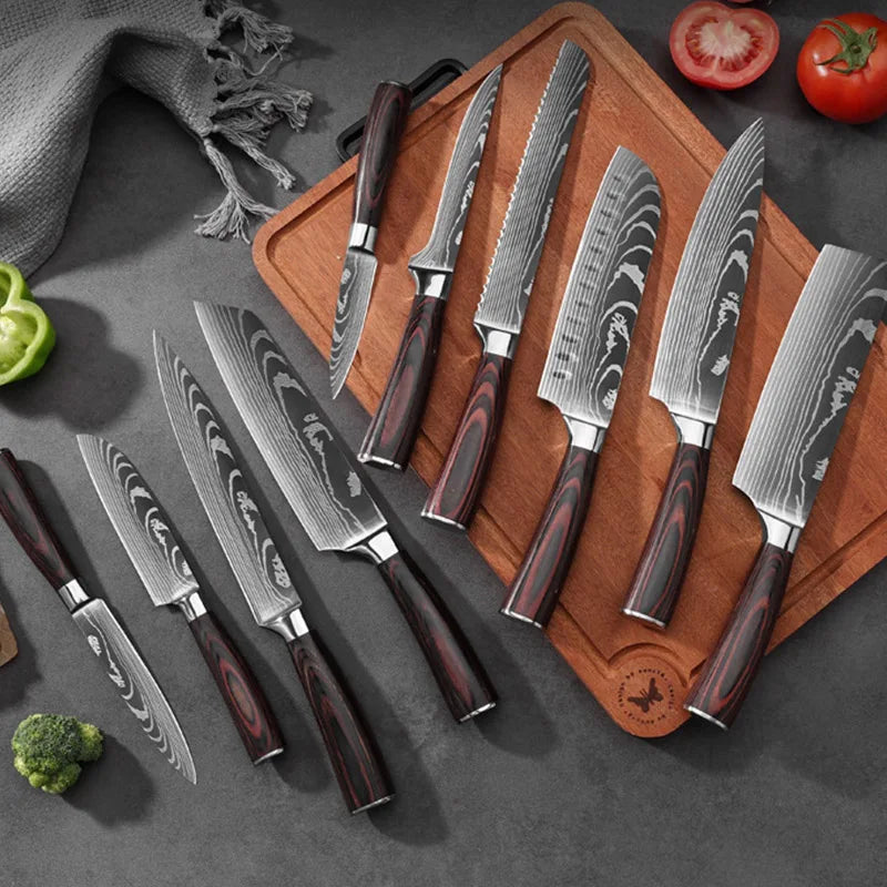 A set of professional Damascus chef knives displayed on a wooden cutting board with surrounding produce.