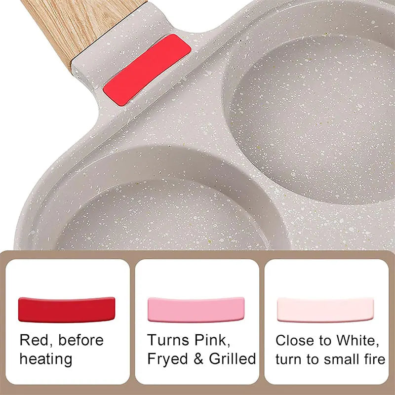 A silicone omelette pan with a wooden handle shows color changes from red before heating to pink after frying and grilling, t