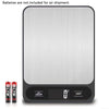 A silver digital kitchen scale with a black base, showing the display set to 0g and unit.