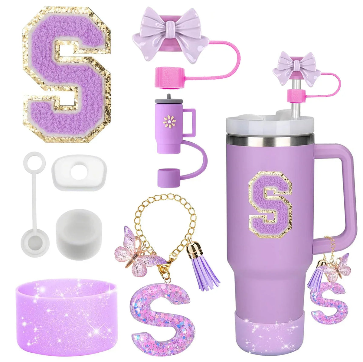 A set of purple silicone straw toppers and accessories for tumblers, including a large letter S and a matching tumbler.