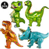 A set of four dinosaur-themed cupcake toppers featuring green, yellow, and orange dinosaurs.
