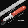 A stainless steel oyster and shell opener with a reddish-orange handle shown next to a ruler.