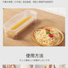 A clear plastic container holds dry noodles, demonstrating the preparation for cooking with a microwave noodle and salad cook