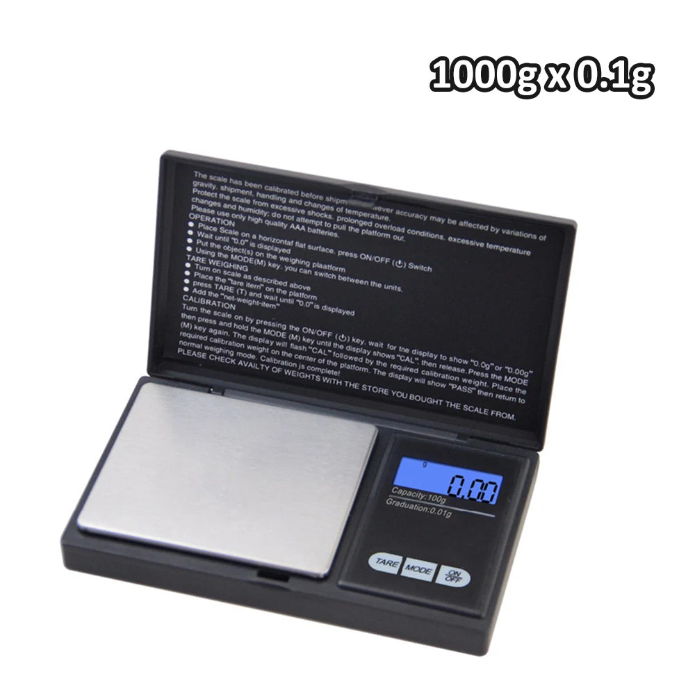 ميزان مجوهرات رقمي دقيق أسود يعرض 0.00 وأزرار للموازنة والطاقة.