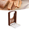 A brown foldable ceramic bread and toast cutter with a slotted plate for slicing bread.