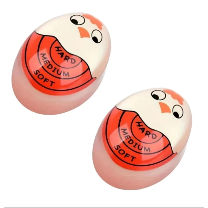 A set of color-changing boiled egg timers showing hard, medium, and soft levels.