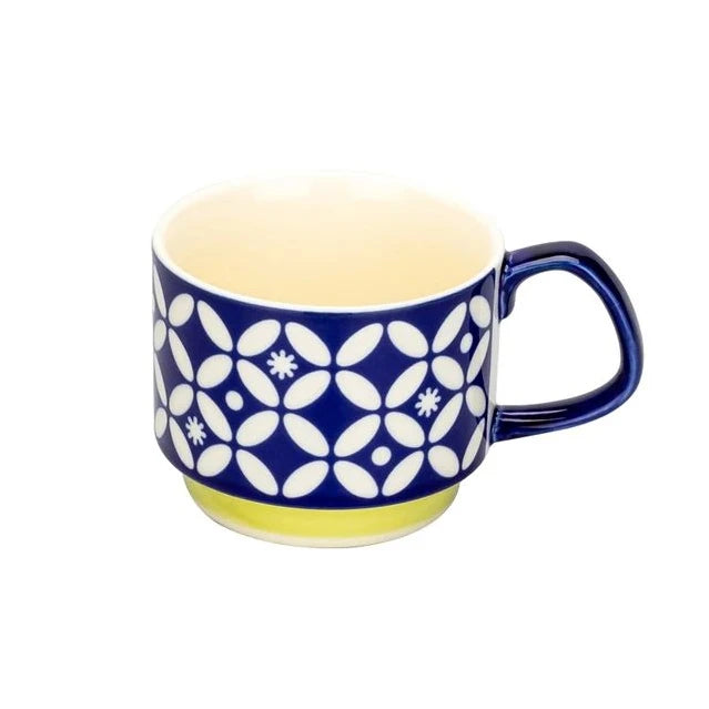 Tasse à café en céramique japonaise rétro bleu et blanc avec une base jaune.
