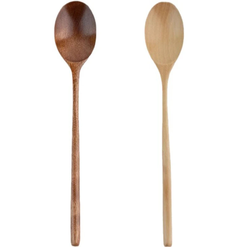 A set of two wooden tableware spoons, one dark brown and one light wood.