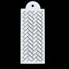 A white plastic cake stencil with a woven pattern on a black background.