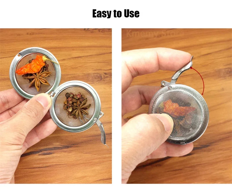 Stainless steel tea infuser ball with a chain holding loose leaf spices and herbs
