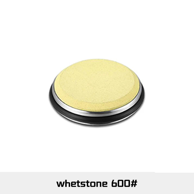 A round, yellow abrasive pad for knife sharpening, labeled wetstone 600#.