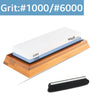 A wooden knife sharpening stone set with two sides labeled 1000 and 6000, featuring a white sharpening surface.