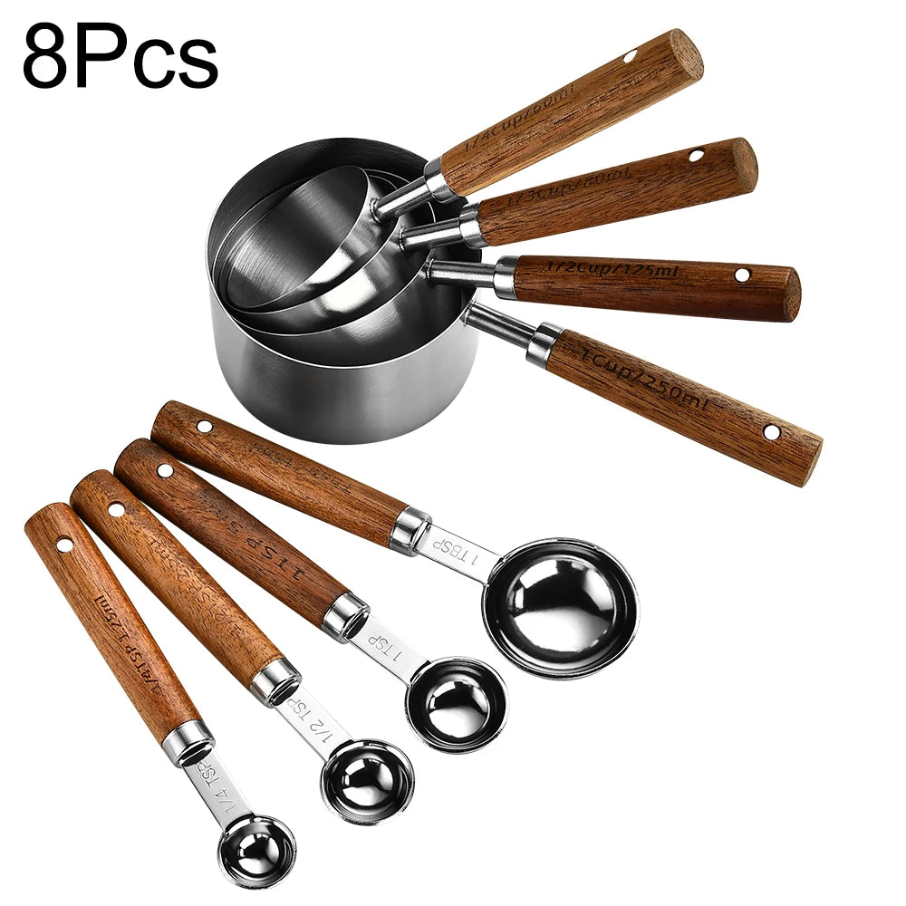Eight pieces of stainless steel measuring spoons and cups for baking and bartending