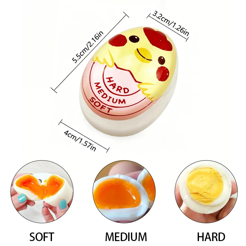 A yellow egg-shaped cooking timer with markings for soft, medium, and hard cooking levels.