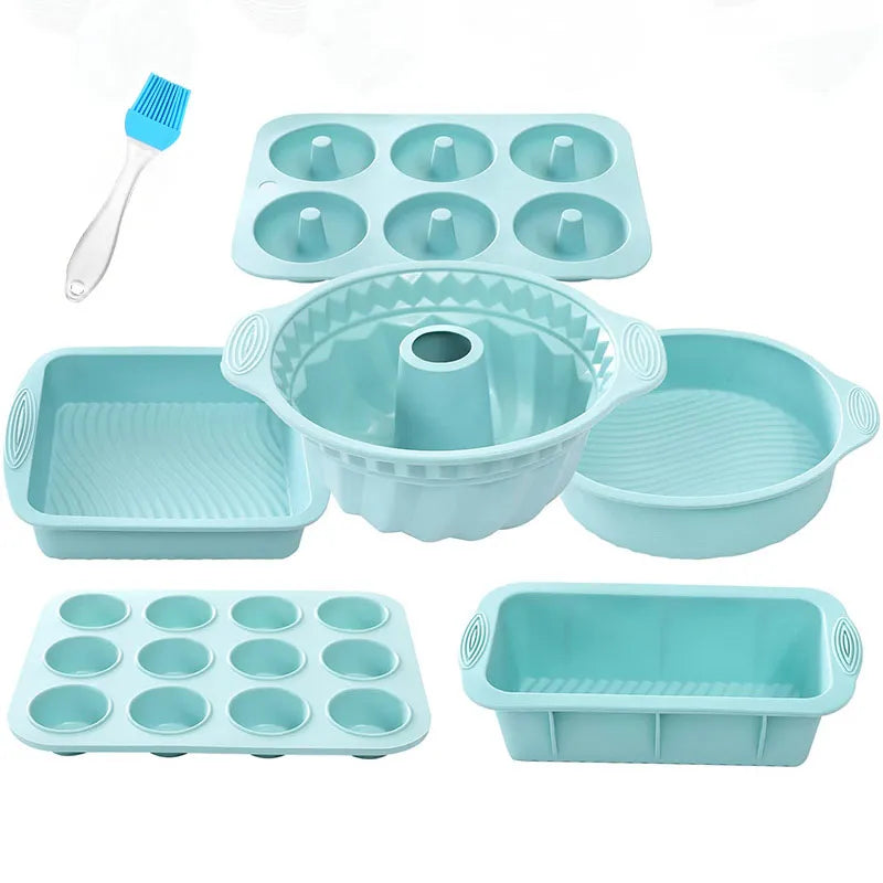 A set of flexible silicone baking pans and a pastry brush in light blue color.