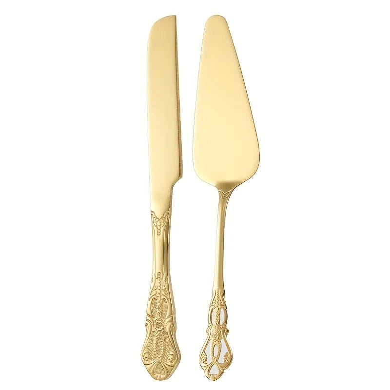 A pair of elegant vintage stainless steel bread knife and cake spatula set with ornate handles.