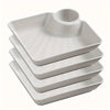 A stack of five white serving plates for appetizers and charcuterie.
