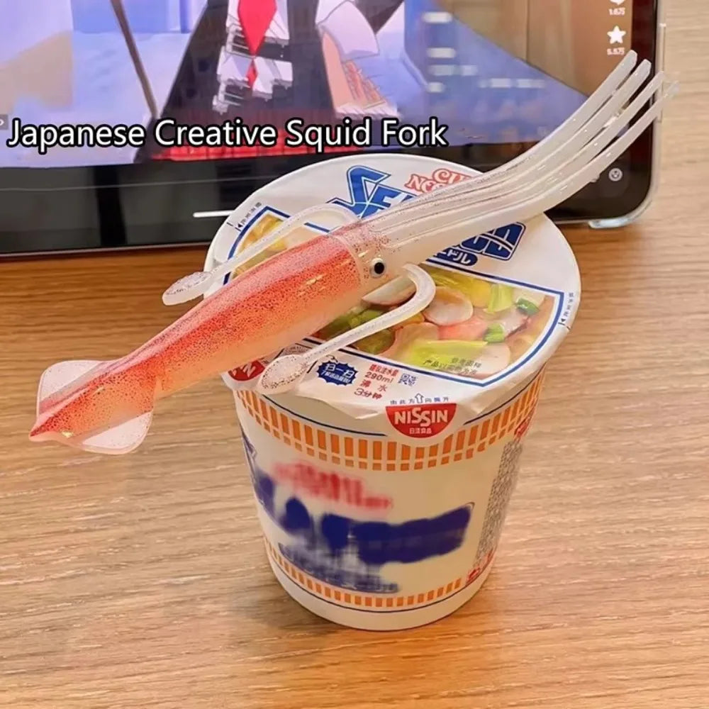 A Japanese creative squid fork is shown resting in a disposable cup filled with food.