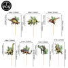 A set of seven dinosaur-themed cupcake toppers featuring various dinosaur species and foliage.