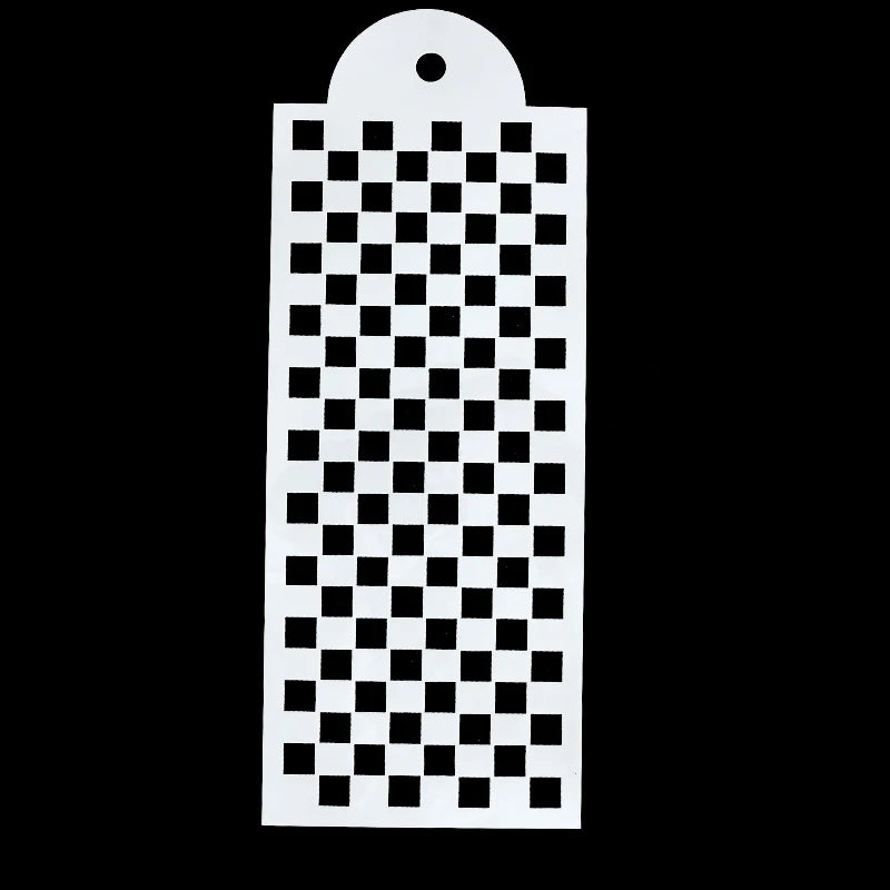 A white plastic cake stencil set with a perforated grid pattern.