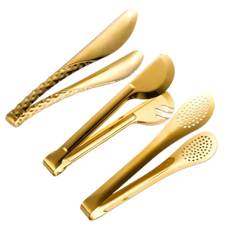 A set of golden stainless steel hot pot colanders including a spoon, fork, and slotted spoon.