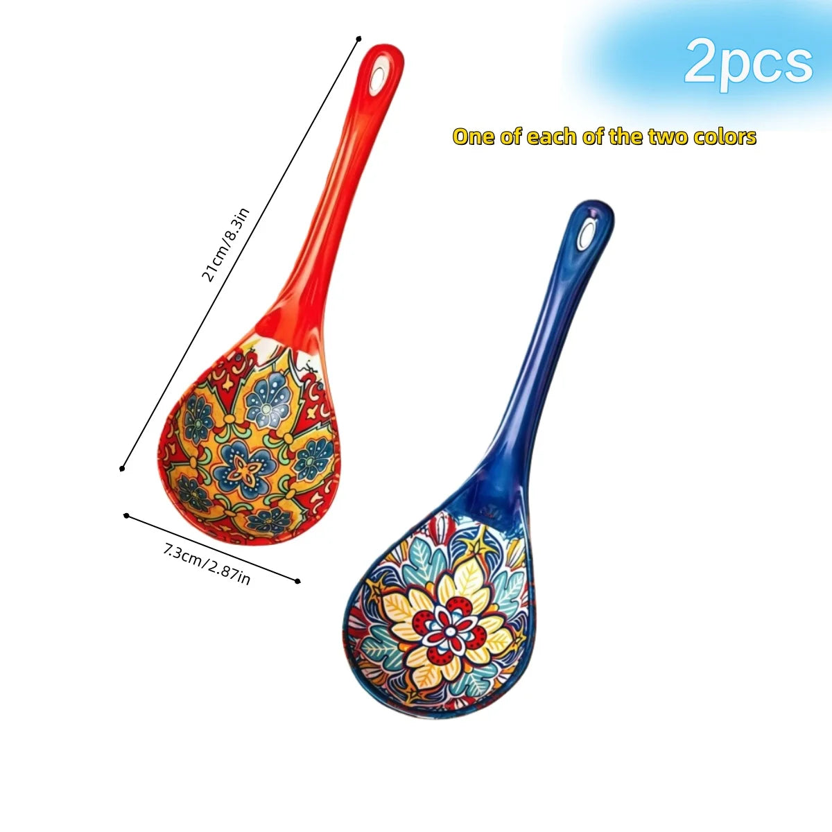 A set of two ceramic serving spoons in vibrant colors featuring intricate floral patterns.